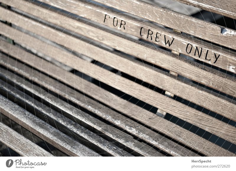 FOR CREW ONLY Navigation Inland navigation Harbour Characters Brown Bench Wooden bench Reserved Bans Inscribe Occupants Personal Diagonal Colour photo