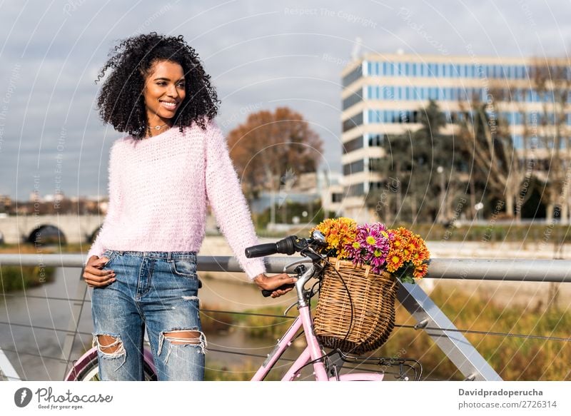 Black young woman riding a vintage bicycle Bicycle Girl Woman Vintage Ride Beautiful Retro Flower Sunbeam Happy Bouquet Summer Youth (Young adults) pretty