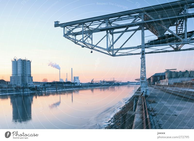 stepping stone Energy industry Coal power station Water Sky Cloudless sky Winter Beautiful weather Ice Frost Industrial plant Harbour Blue Yellow Orange Black