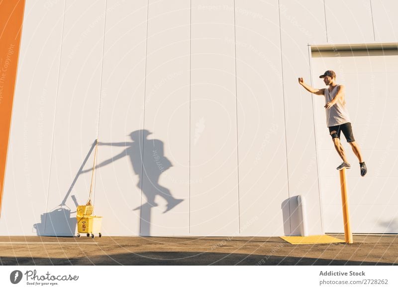 Dancer making creative shadow on wall Man Shadow Balance Creativity Conceptual design Acrobat Silhouette Acrobatic Intellect Body Athletic Posture artistic