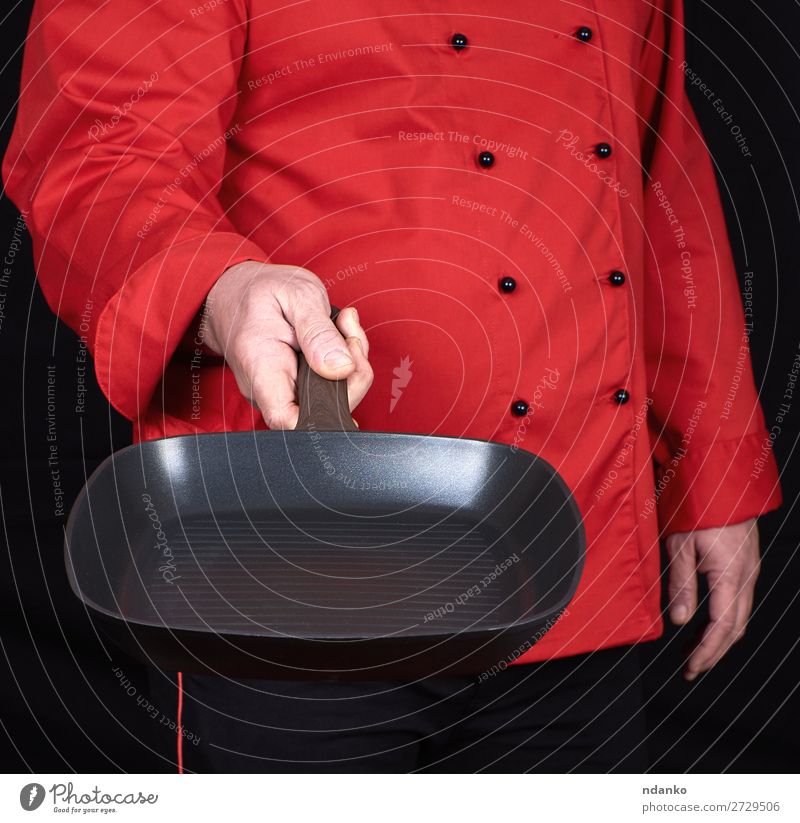 cook holding an empty square black frying pan Pot Pan Kitchen Restaurant Profession Cook Human being Man Adults Hand Clothing Metal New Red Black Cast iron