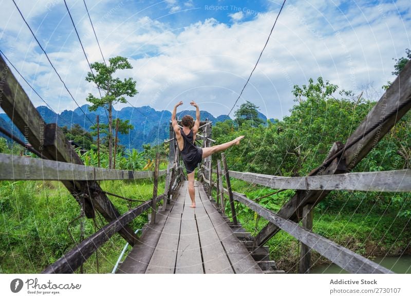 Man meditating on bridge Handstand Bridge Virgin forest Performance Exotic Sports Action Tourism Nature workout Healthy Vacation & Travel