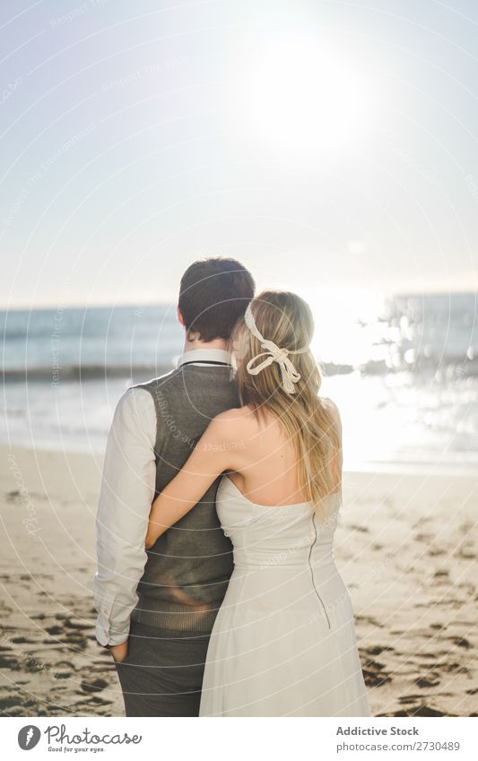Bridal couple embraced on the beach Couple bridal Beach tender in love Wedding Expression romantic Feasts & Celebrations Style Relationship Love Engagement