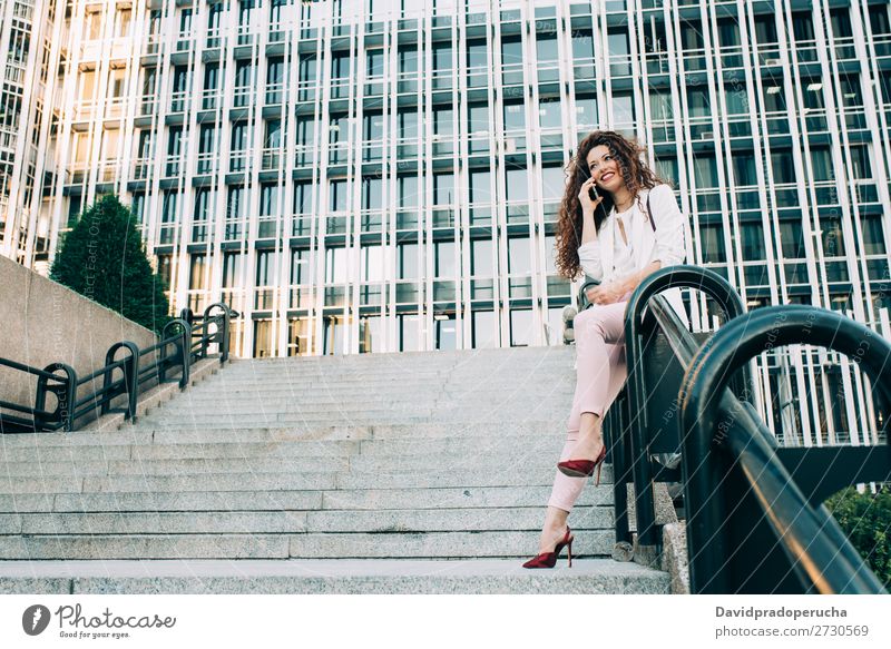 Young redhead business woman walking on the stairs Woman Red-haired Business Businesswoman Technology Work and employment Walking Stairs Suit Pink boss Lady