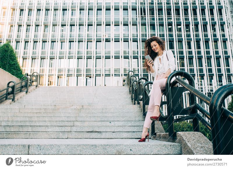 Young redhead business woman walking on the stairs Woman Red-haired Business Businesswoman Technology Work and employment Walking Stairs Suit Pink boss Lady