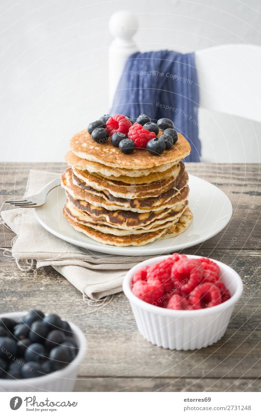 Pancakes with raspberries, blueberries and honey Sweet Dessert Breakfast Blueberry Raspberry Berries Red Baking Food Healthy Eating Food photograph Dish Plate