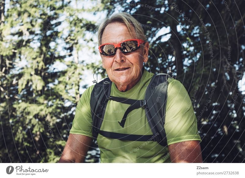 Sporty pensioner hiking Lifestyle Leisure and hobbies Vacation & Travel Trip Adventure Mountain Hiking Male senior Man 60 years and older Senior citizen Nature