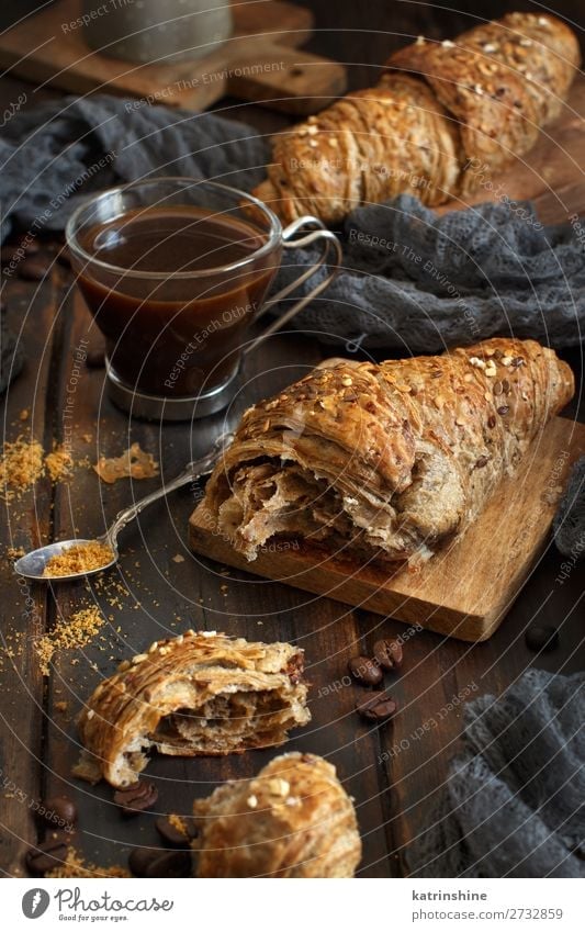 Breakfast with coffee and croissant Bread Croissant Dessert Beverage Espresso Spoon Table Dark Fresh Delicious Brown White Tradition background Bakery caffee