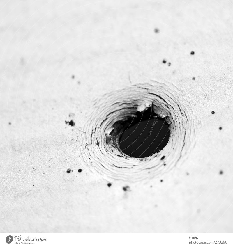 Brandenburg wormhole Hollow Shot hole Point Metal Frustration Threat Center point Risk Safety Surprise Decline Black & white photo Exterior shot Close-up Detail