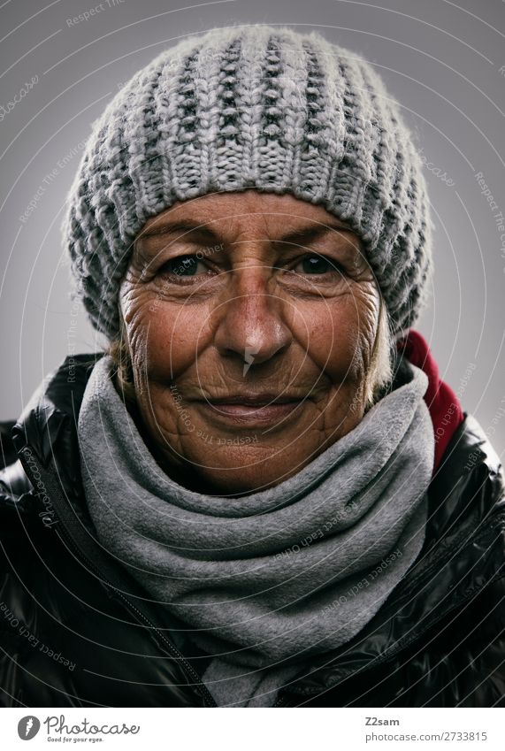Pensioner in winter outfit Lifestyle Elegant Female senior Woman 60 years and older Senior citizen Winter Fashion Jacket Scarf Cap Smiling Laughter Old
