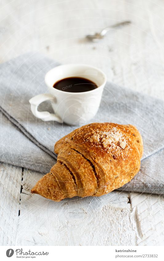 Breakfast with coffee and croissant Bread Croissant Dessert Beverage Espresso Spoon Table Fresh Delicious Brown White Tradition background Bakery caffee