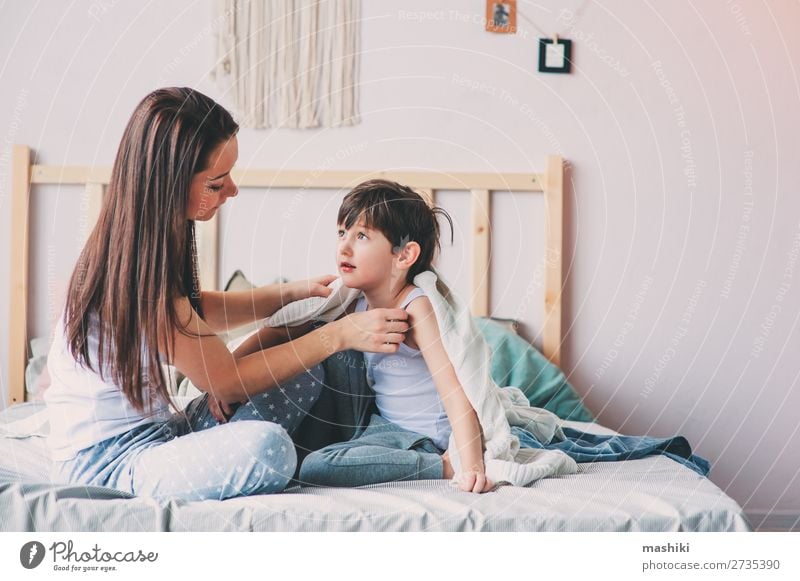 happy mother and son playing Joy Happy Life Relaxation Playing Bedroom Parenting Child Toddler Boy (child) Parents Adults Mother Family & Relations Infancy Love