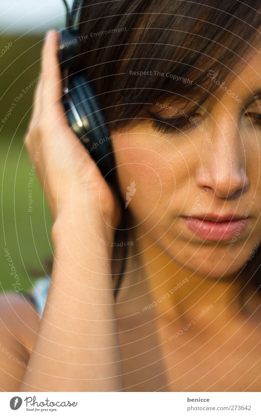 sound Woman Human being Music Headphones To enjoy Dark-haired Exterior shot Portrait photograph Close-up To hold on Listening European Young woman Sadness