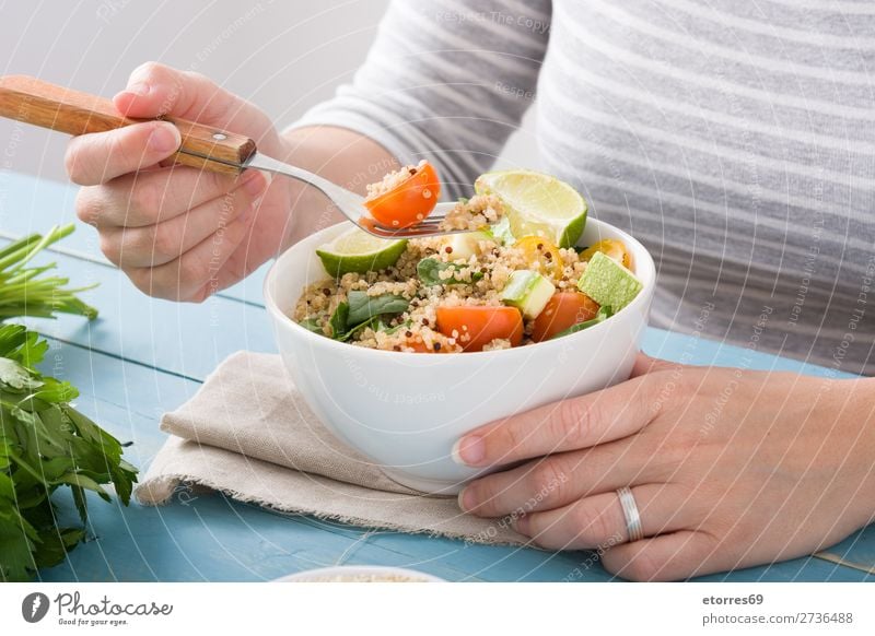 Woman eating quinoa and vegetables Vegan diet Vegetable Tomato Bowl Vegetarian diet Healthy Healthy Eating Diet grain Agriculture Preparation Crunchy superfood