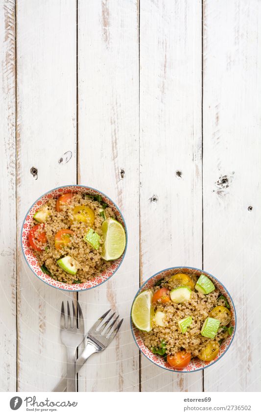 Quinoa bowl with tomatoes, zucchini and lime quinoa Vegan diet Vegetable Tomato Spinach Bowl Healthy Eating Diet Heap Grain Agriculture Preparation Crunchy