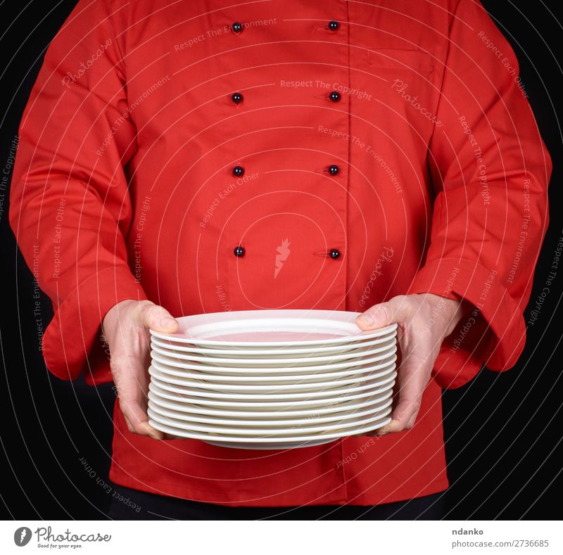 stack of round white empty plates Plate Kitchen Restaurant Profession Cook Human being Man Adults Hand Stand Black White Caucasian ceramic chef cooking Domestic
