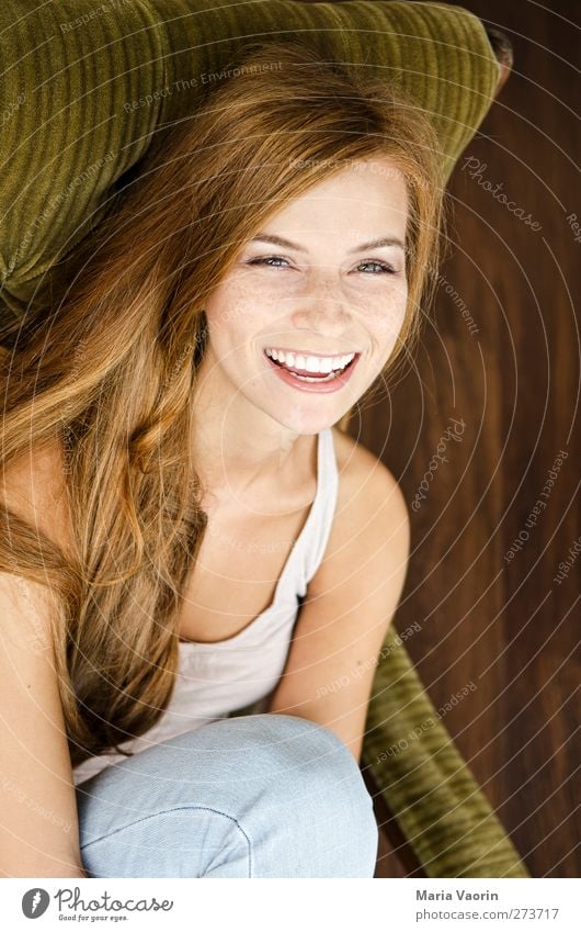 good-humoured image Living or residing Armchair Living room Human being Feminine Young woman Youth (Young adults) 1 18 - 30 years Adults Jeans Brunette