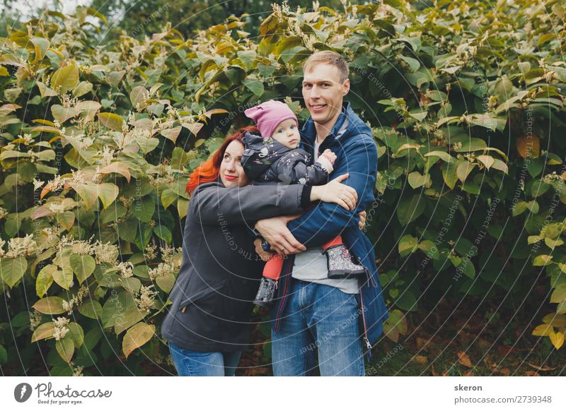 happy family on a walk with a small child Lifestyle Leisure and hobbies Vacation & Travel City trip Human being Masculine Feminine Child Baby Girl Parents