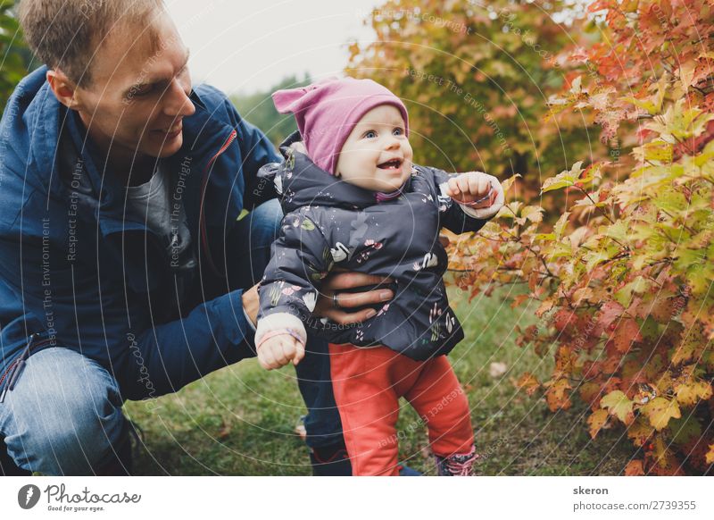 young dad walks with his little daughter Lifestyle Leisure and hobbies Parenting Education Work and employment Profession Human being Masculine Child Baby