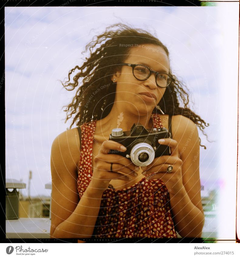 ... and click! Camera Photography Young woman Youth (Young adults) Head Mouth Hand Shoulder 18 - 30 years Adults Medium format Clouds Summer Roof Chimney Dress