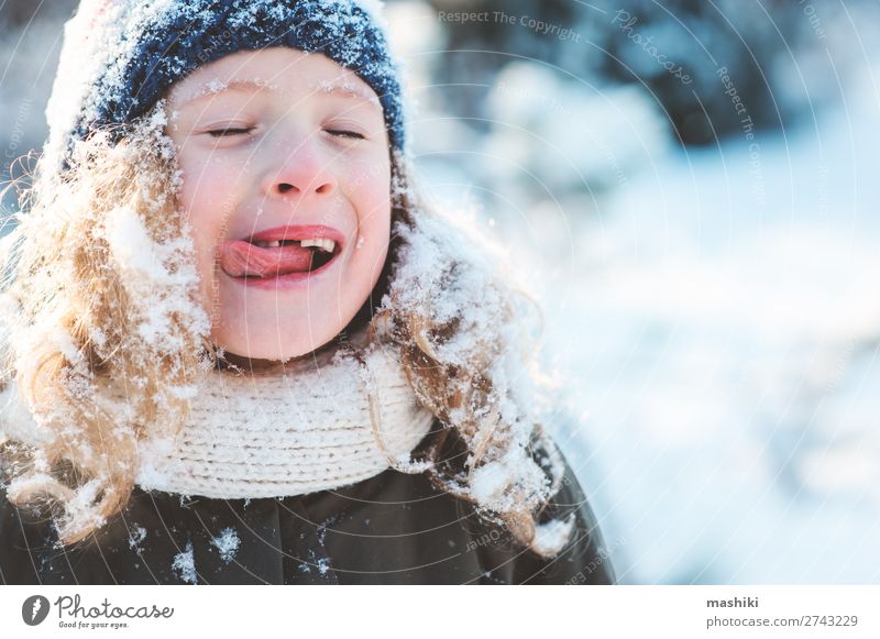 close up winter portrait of happy kid girl Joy Happy Playing Knit Vacation & Travel Winter Snow Garden Child Weather Forest Scarf Hat Drop Smiling Laughter