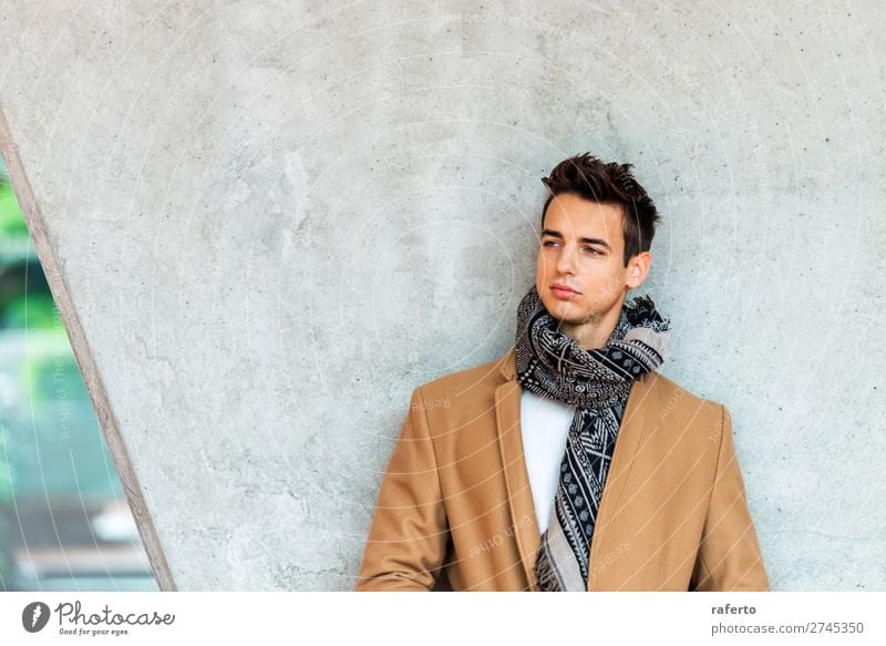 Front view of trendy young man wearing coat and scarf Lifestyle Elegant Style Beautiful Hair and hairstyles Human being Masculine Young man Youth (Young adults)