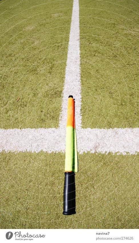 on the line Sports Ball sports Referee Linesman Football pitch Green Orange White Watchfulness Flag Colour photo Multicoloured Exterior shot Deserted