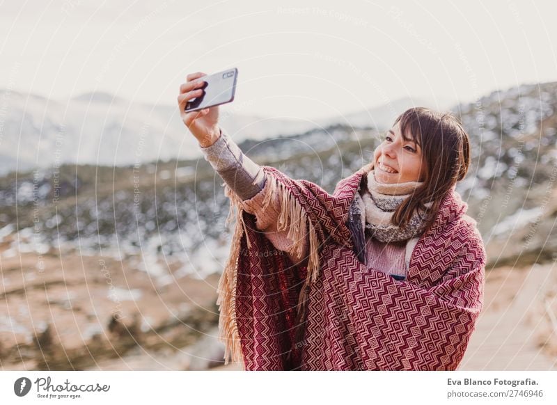 woman on the sunset in nature using mobile phone Lifestyle Happy Beautiful Wellness Harmonious Vacation & Travel Trip Adventure Freedom Sun Winter Snow Mountain