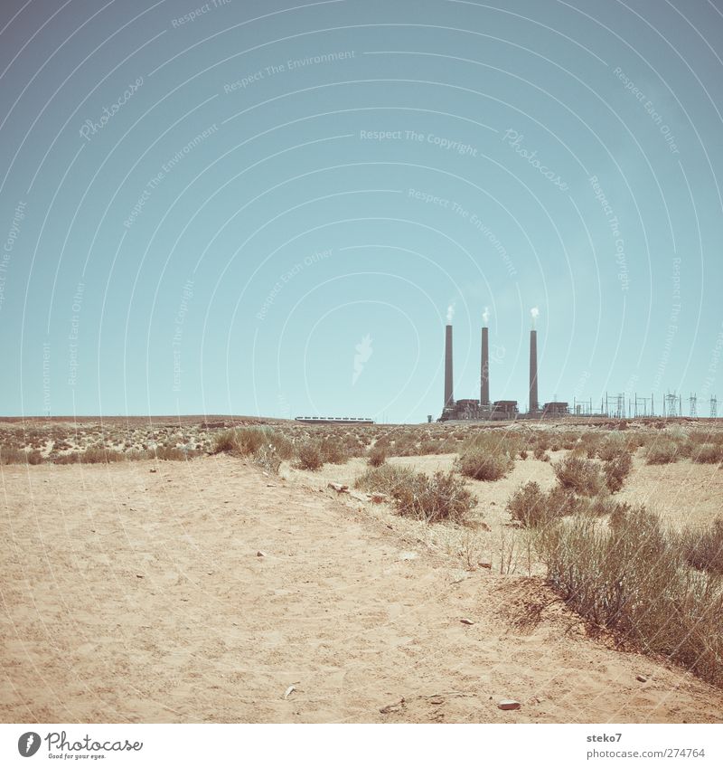 desert current Coal power station Cloudless sky Bushes Desert Far-off places Blue Yellow Climate Environmental pollution Electricity Chimney 3 Warmth