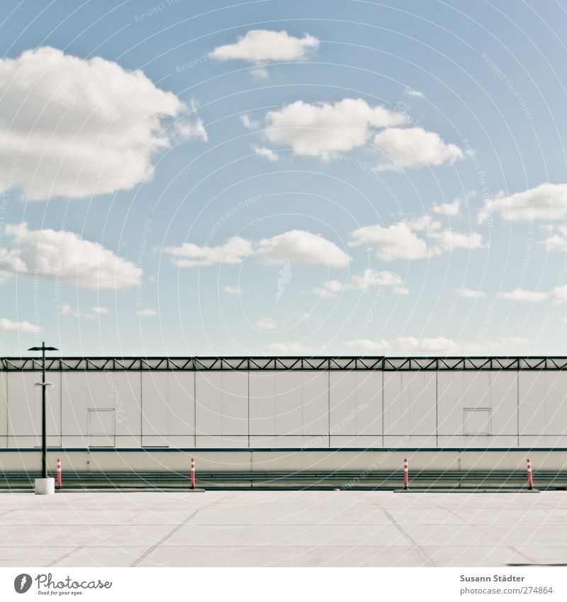 - Clouds Deserted High-rise Places Architecture Wall (barrier) Wall (building) Facade Terrace Sharp-edged Modern Parking lot Barrier Lantern Minimalistic