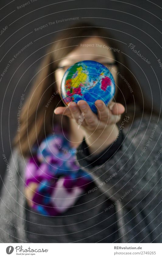 Woman holding a globe in her hand Human being Feminine Adults 1 18 - 30 years Youth (Young adults) Environment To hold on Sustainability Natural