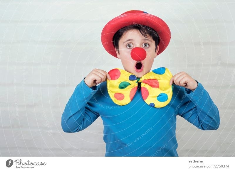 child with clown nose and hat in carnival Lifestyle Joy Feasts & Celebrations Carnival Hallowe'en Birthday Human being Masculine Child Infancy 1 8 - 13 years