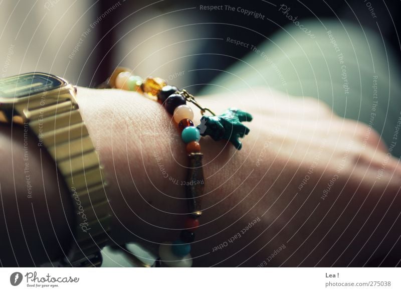 Hottehü Feminine Hand 1 Human being Accessory Jewellery Wristwatch Bracelet Sit Multicoloured Gold Turquoise Loneliness Relaxation Colour photo Interior shot