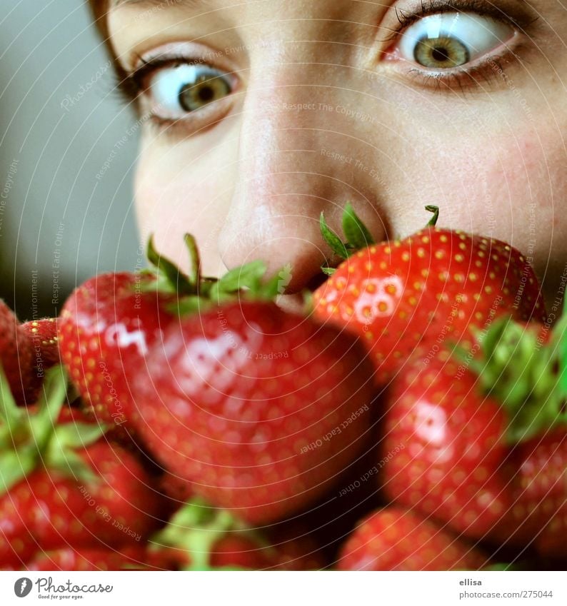 strawberry beard Fruit Eating Healthy Eating Feminine Young woman Youth (Young adults) Eyes Nose To feed Curiosity Strawberry Strawberry variety Green Red Odor