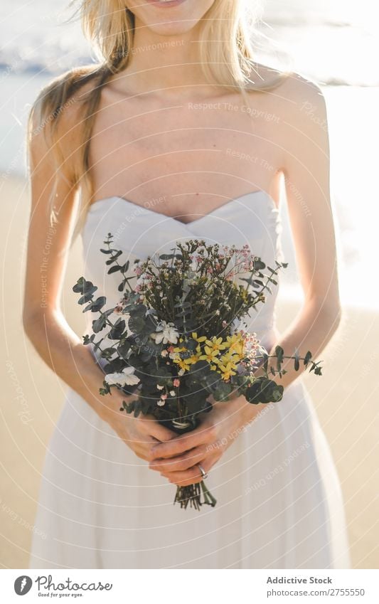 Charming young bride with flowers on beach Woman Bride Bouquet Beach Happiness Portrait photograph Cheerful human face Dress in love Love Elegant Engagement