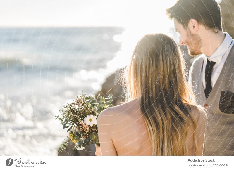 Sensual Wedding Couple Posing On Shoreline A Royalty Free