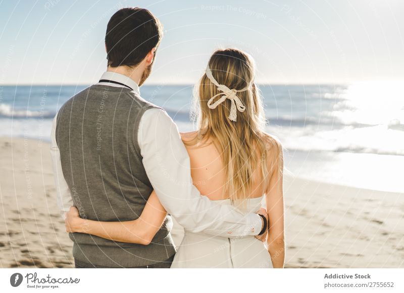 Sensual Wedding Couple Posing On Shoreline A Royalty Free
