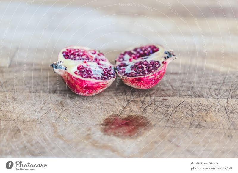 Fresh pomegranate halves on wood composition Pomegranate Rustic Healthy Sweet Fruit Vegetarian diet minimalist Diet Organic Shabby Tasty Juicy Wood Colour Red