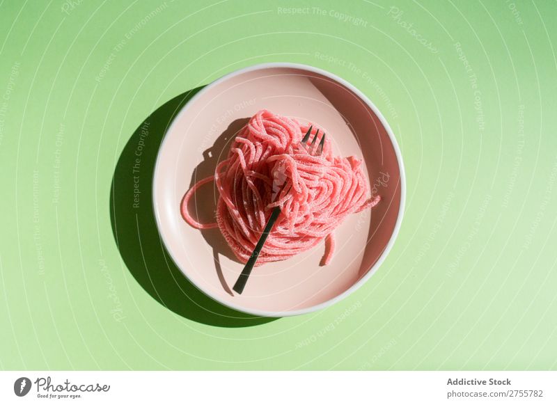 Jelly worms on plate Worms Pink Conceptual design Pasta marmalade Sweet Idea Plate Arrangement Fork served Tasty Candy Bright Meal Eating minimalist conceptual