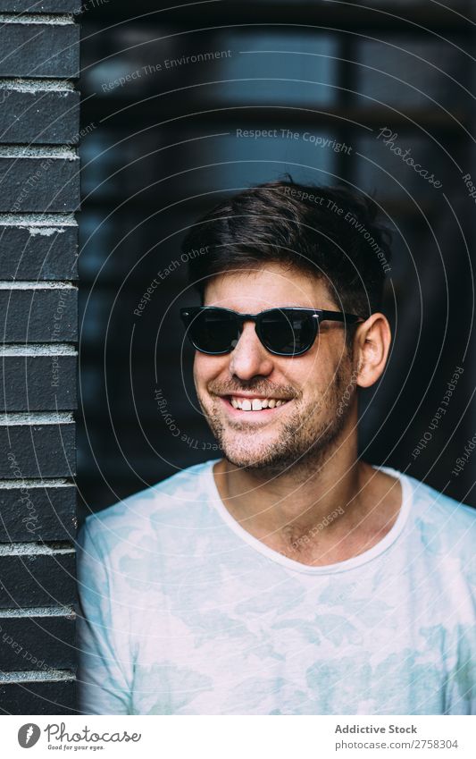 Cheerful man in sunglasses Man Sunglasses Smiling Happy Self-confident Youth (Young adults) Cool (slang) Human being Portrait photograph Modern Model