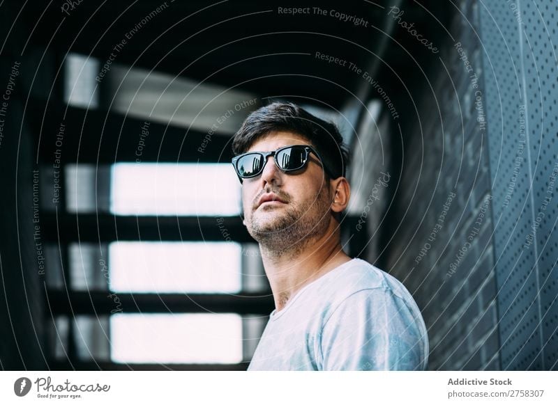 man in sunglasses cheerful smiling happy confident young cool person portrait modern model fashionable male serious casual handsome guy adult caucasian posing