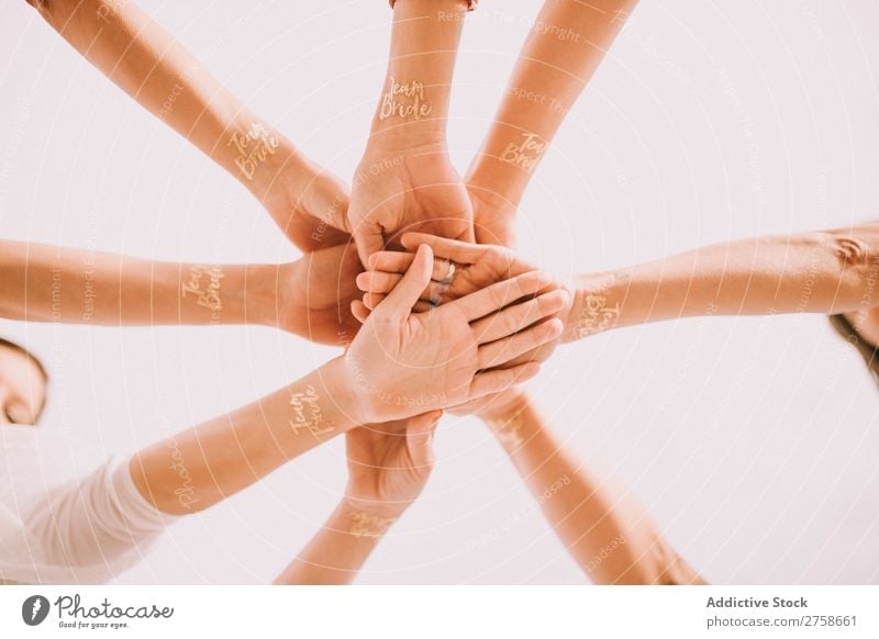Hands of cheering people in circle Applause Team Bride Group Human being Teamwork Together Business partnership Cheerful cooperation Friendship Success