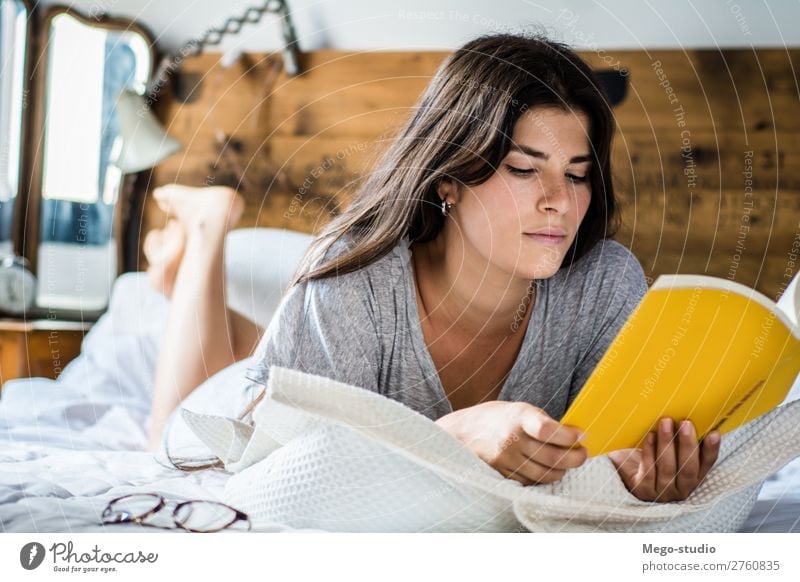 woman laying in bed and reading book Coffee Lifestyle Happy Beautiful Relaxation Leisure and hobbies Reading Winter House (Residential Structure) Bedroom