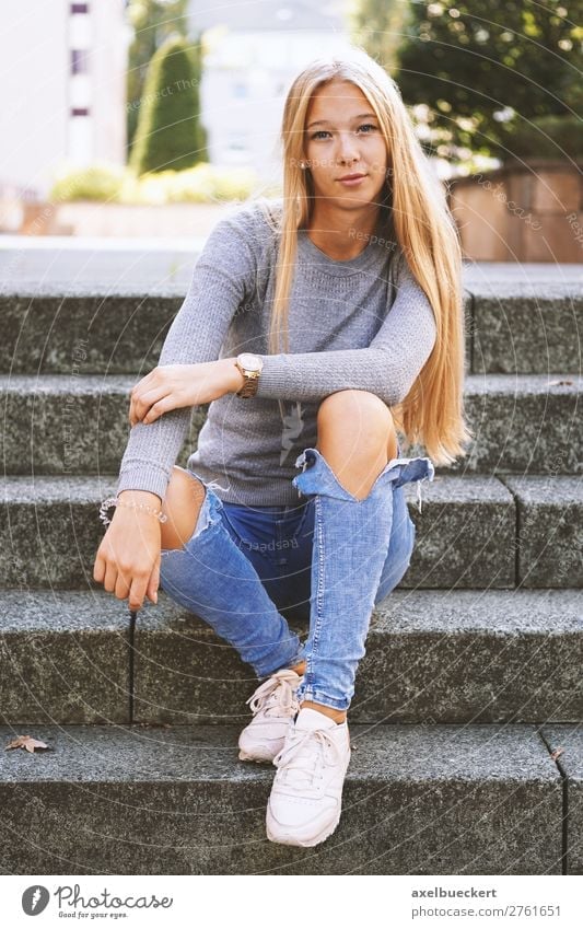 female teenager sitting outside on stairs Lifestyle Leisure and hobbies Human being Feminine Girl Young woman Youth (Young adults) Woman Adults 1 13 - 18 years