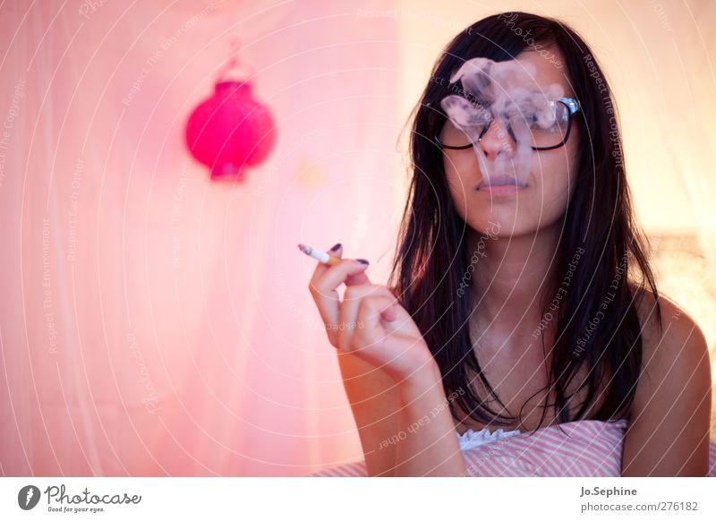 just blowin' smoke Lifestyle Style Smoking Intoxicant Bedroom Human being Feminine Young woman Youth (Young adults) 1 18 - 30 years Adults Eyeglasses