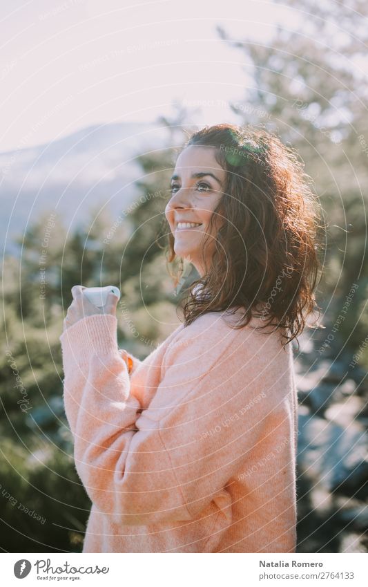 brunette girl smiles happily as she grabs a bottle of water Bottle Lifestyle Happy Beautiful Relaxation Vacation & Travel Tourism Trip Adventure Freedom Camping