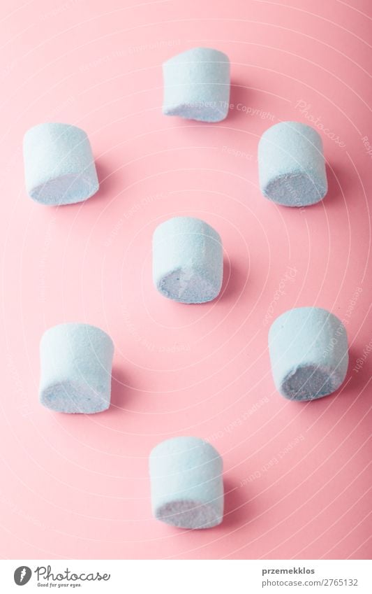 Blue marshmallows on plain pink background Dessert Candy Nutrition Eating Diet Design Table Bright Delicious Pink Colour Creativity colorful flat food isolated