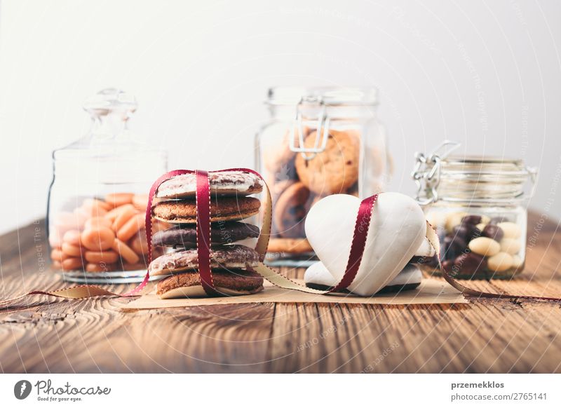 Gingerbread cookies, candies, cakes in jars on wooden table Dessert Nutrition Eating Diet Lifestyle Table Heart To enjoy Delicious Brown Baking Bakery biscuit