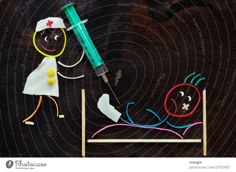 Gummy worms: Get well soon! A nurse comes with a big syringe. The patient is lying in bed with a broken leg and a plaster on his face Services Health care