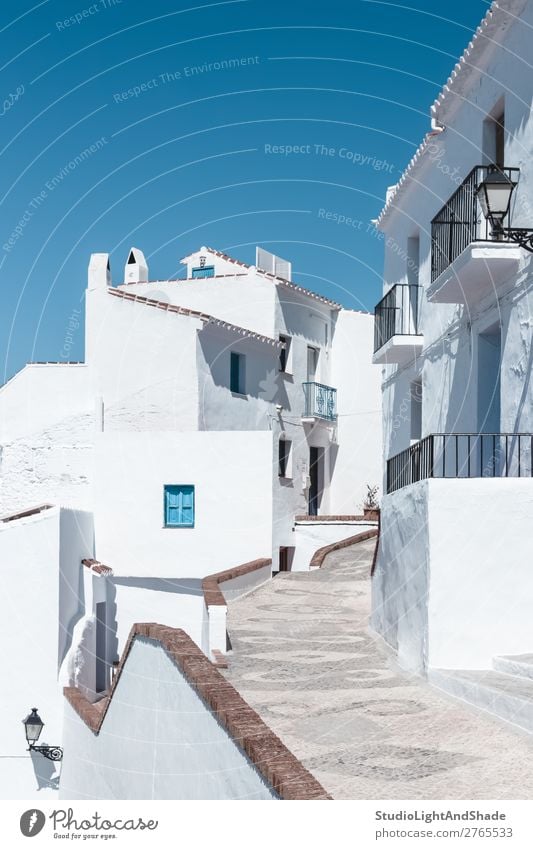 Street with white houses under blue sky Vacation & Travel House (Residential Structure) Sky Town Building Architecture Facade Balcony Blue White Colour